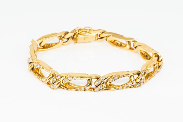 A DIAMOND SET CURB BRACELET