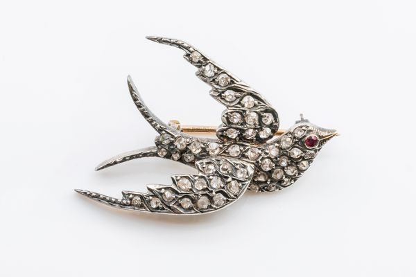 A VICTORIAN DIAMOND SWALLOW BROOCH