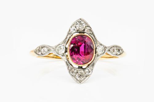 AN ART NOUVEAU RUBY AND DIAMOND RING