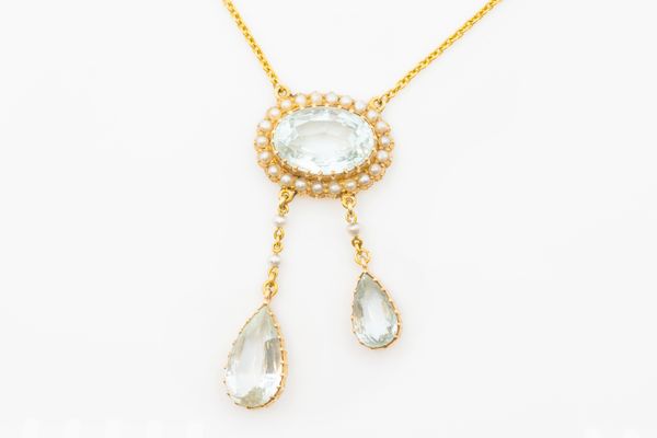 AN EDWARDIAN AQUAMARINE AND SEED PEARL PENDANT