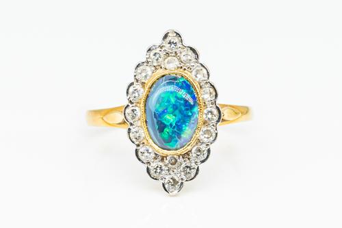 AN OPAL AND DIAMOND RING