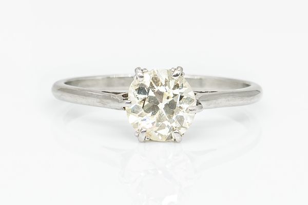 A 0.91 CARAT DIAMOND SINGLE STONE RING