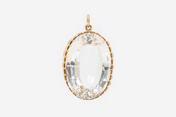 AN EDWARDIAN ROCK CRYSTAL PENDANT