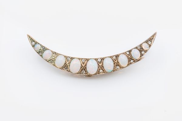 A VICTORIAN OPAL AND DIAMOND CRESCENT BROOCH