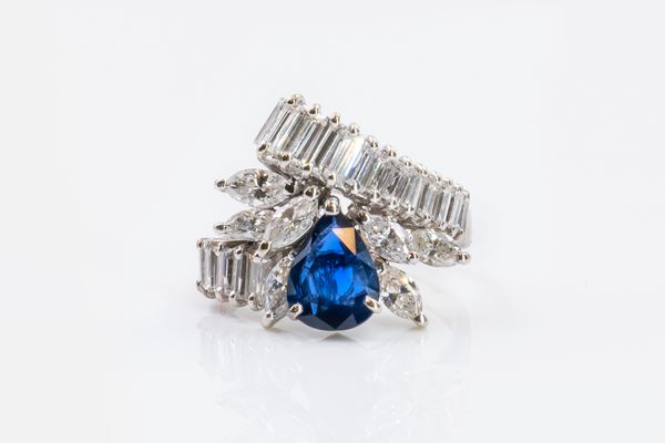 A SAPPHIRE AND DIAMOND RING