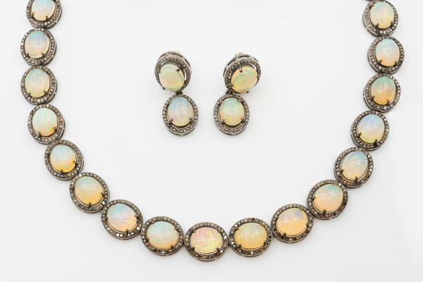 AN OPAL AND DIAMOND NECKLACE AND EARRING SET