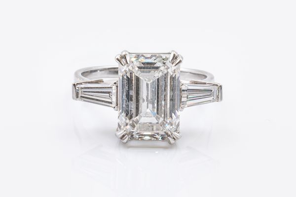 AN 5.04 CARAT DIAMOND THREE STONE RING - LAB GROWN