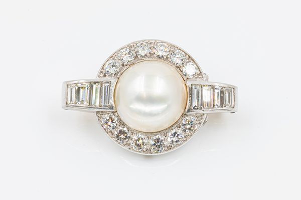 AN ART DECO DIAMOND AND PEARL BROOCH