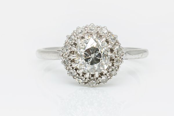 A 1.50 CARAT DIAMOND CLUSTER RING