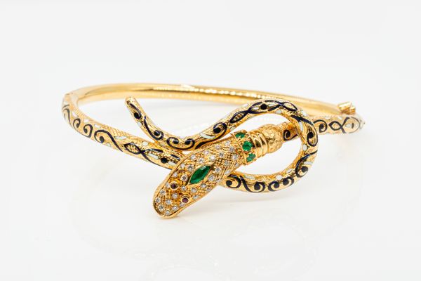 A GEMSET AND ENAMEL SNAKE BRACELET