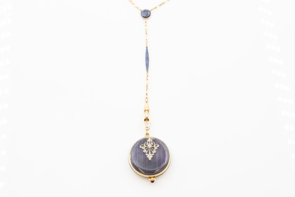 AN ENAMEL AND DIAMOND SET FOB WATCH AND CHAIN