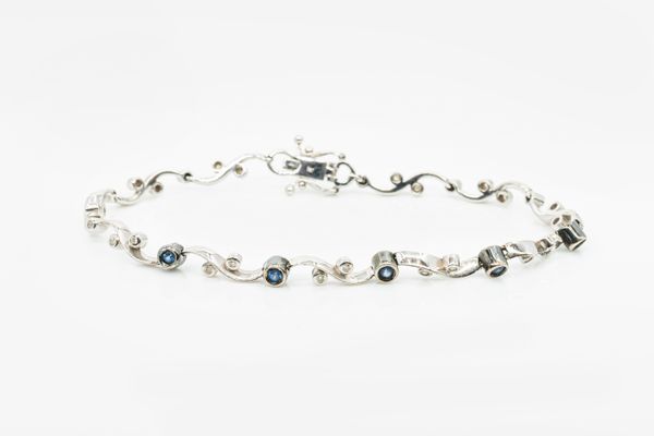 A SAPPHIRE AND DIAMOND WAVE LINK BRACELET