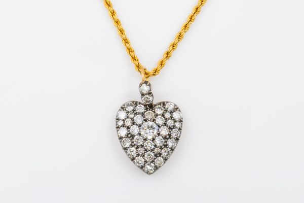 A HEART SHAPED DIAMOND PENDANT LOCKET AND CHAIN