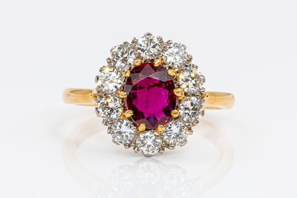 A RUBY AND DIAMOND CLUSTER RING