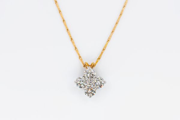 A DIAMOND PENDANT AND CHAIN