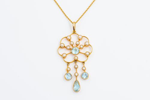 AN EDWARDIAN AQUAMARINE AND PEARL PENDANT