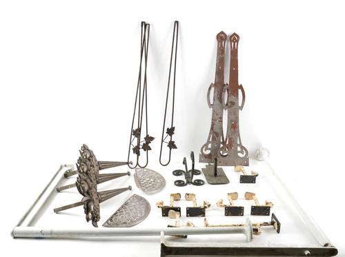 A LARGE GROUP OF BRONZE AND METAL WALL BRACKETS AND MOUNTS