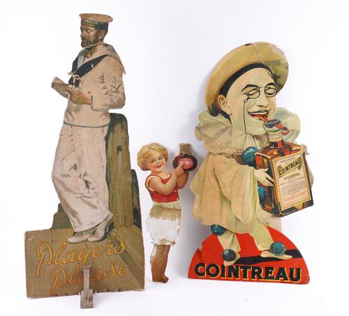A GROUP OF THREE MID CENTURY CARDBOARD ADVERTISING CUT OUTS