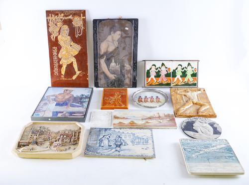 A GROUP OF EARLY TO MID 20TH CENTURY DECORATIVE TILES AND PLAQUES