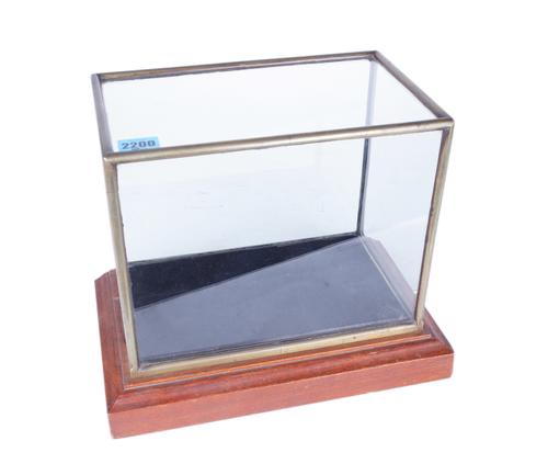 A MID 20TH CENTURY BRASS AND GLASS DISPLAY CASE