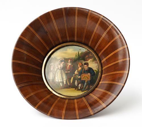 A NORTH EUROPEAN FRUITWOOD AND PAINTED CENTRE DISH OR BOWL