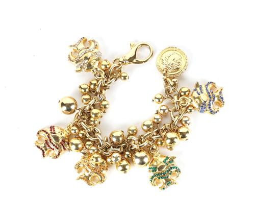GIANNI VERSACE: A GOLD COLOURED COSTUME CHARM BRACELET