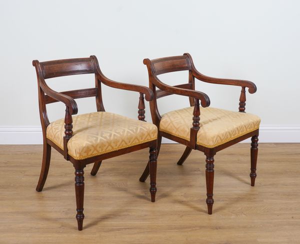 A PAIR OF REGENCY MAHOGANY BAR BACK OPEN ARMCHAIRS (2)