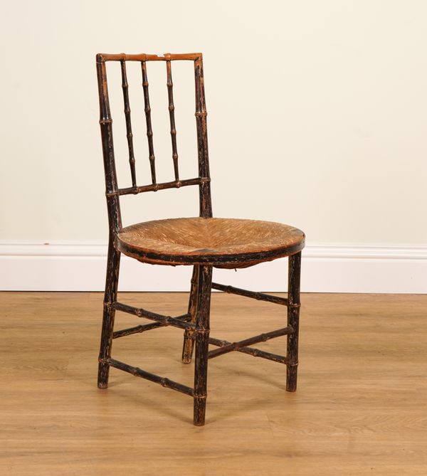 A 19TH CENTURY PAINTED BAMBOO SUSSEX CHAIR