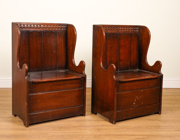 TITCHMARSH & GOODWIN; A PAIR OF 18TH CENTURY STYLE OAK BOX SETTLES (2)