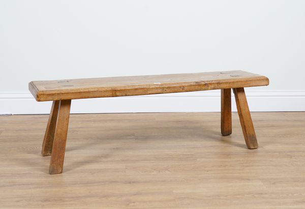 AN ELM TOPPED LOW BENCH