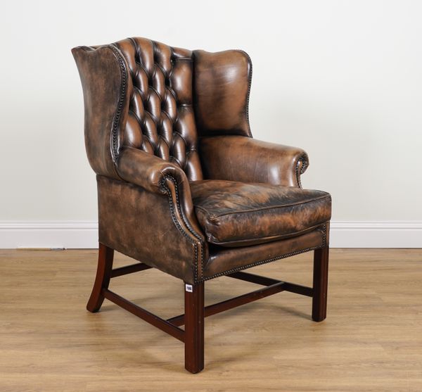 A MID-18TH CENTURY STYLE WINGBACK ARMCHAIR