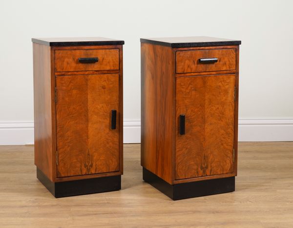 A PAIR OF MID-20TH FIGURED WALNUT BEDSIDE CUPBOARDS (2)