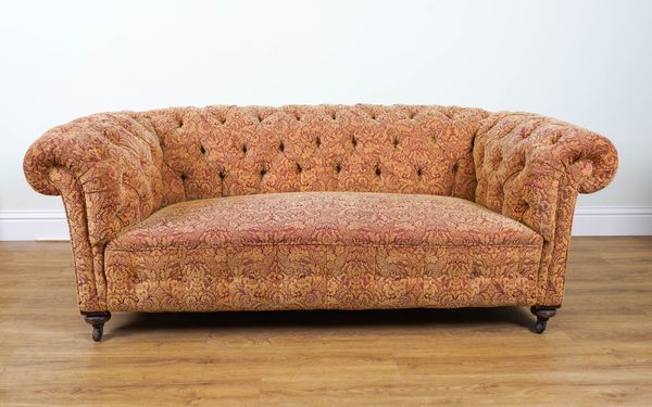 A VICTORIAN MAHOGANY FRAMED CHESTERFIELD SOFA