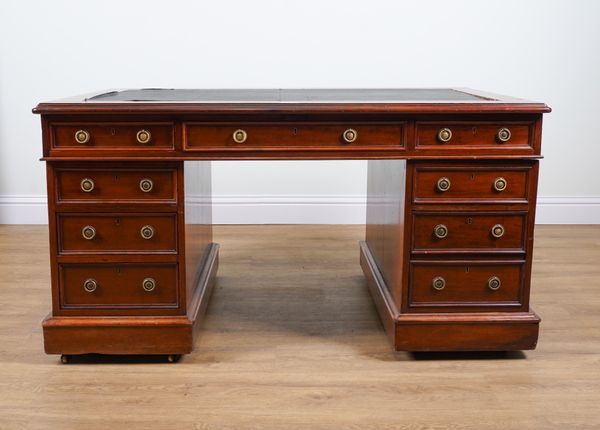 AN EDWARDIAN MAHOGANY PEDESTAL DESK