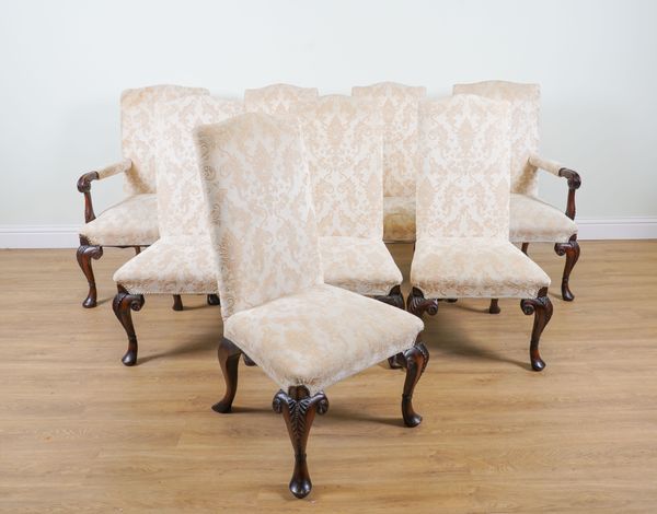 BRIGHTS OF NETTLEBEDS; A SET OF EIGHT GEORGE II STYLE HUMPBACK DINING CHAIRS ON CARVED MAHOGANY CABRIOLE SUPPORTS (8)