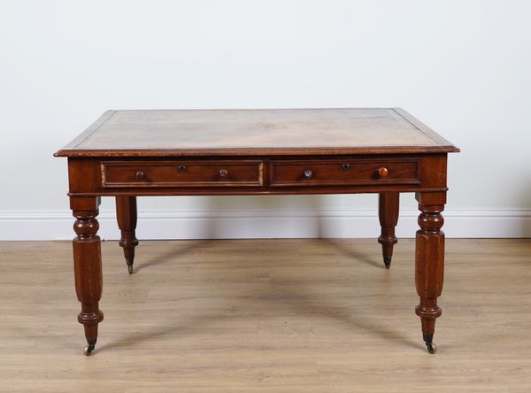 A VICTORIAN MAHOGANY LIBRARY DESK