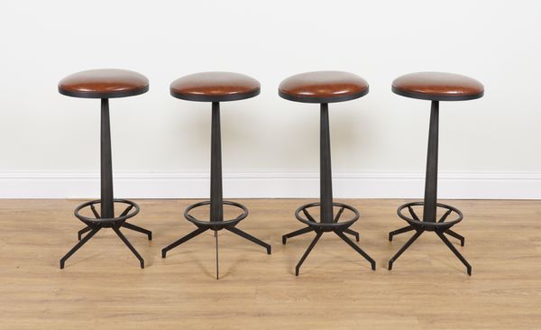 A SET OF FOUR METAL CIRCULAR STOOLS (4)