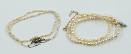 A SINGLE ROW NECKLACE OF GRADUATED SEED PEARLS AND ANOTHER SINGLE ROW NECKLACE OF GRADUATED CULTURED PEARLS (2)