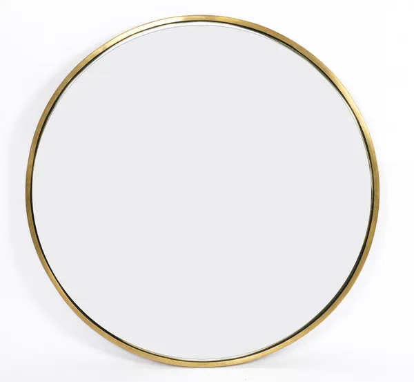 A MODERN BRASS FRAMED CONVEX WALL MIRROR