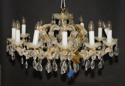 POSSIBLY SWAROVSKI CRYSTAL: A TWELVE LIGHT GLASS CHANDELIER