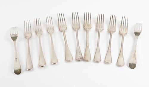 TEN SILVER AND ONE FURTHER FEATHER EDGED OLD ENGLISH PATTERN TABLE FORKS (11)