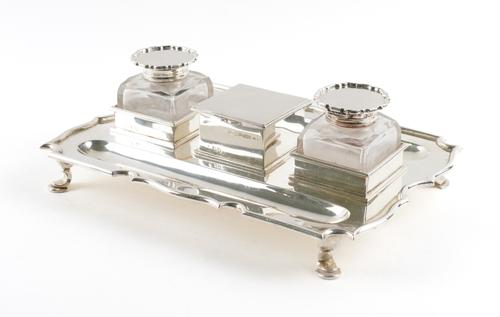 A SILVER SHAPED RECTANGULAR PEN AND INK STAND
