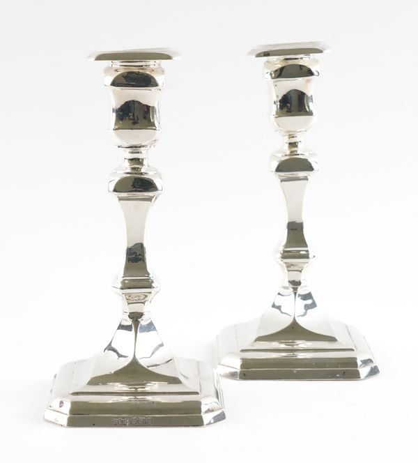 A PAIR OF SILVER TABLE CANDLESTICKS