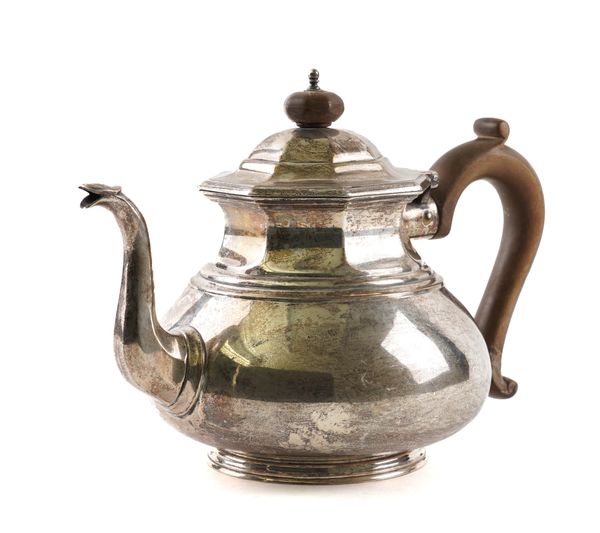 A SILVER TEAPOT