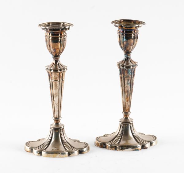 A PAIR OF SILVER TABLE CANDLESTICKS (2)