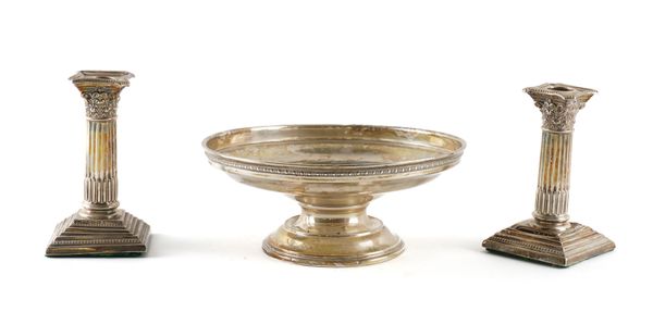 A SILVER DISH AND A PAIR OF SILVER CANDLESTICKS (3)