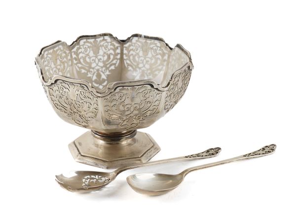 A SILVER OCTAGONAL BOWL WITH A MATCHING PAIR OF SALAD SERVERS