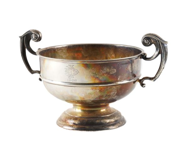 A SILVER TWIN HANDLED TROPHY BOWL