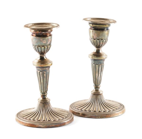 A PAIR OF SILVER TABLE CANDLESTICKS