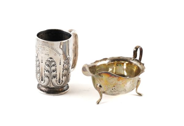 A SILVER CHRISTENING MUG AND A SILVER SAUCEBOAT (2)